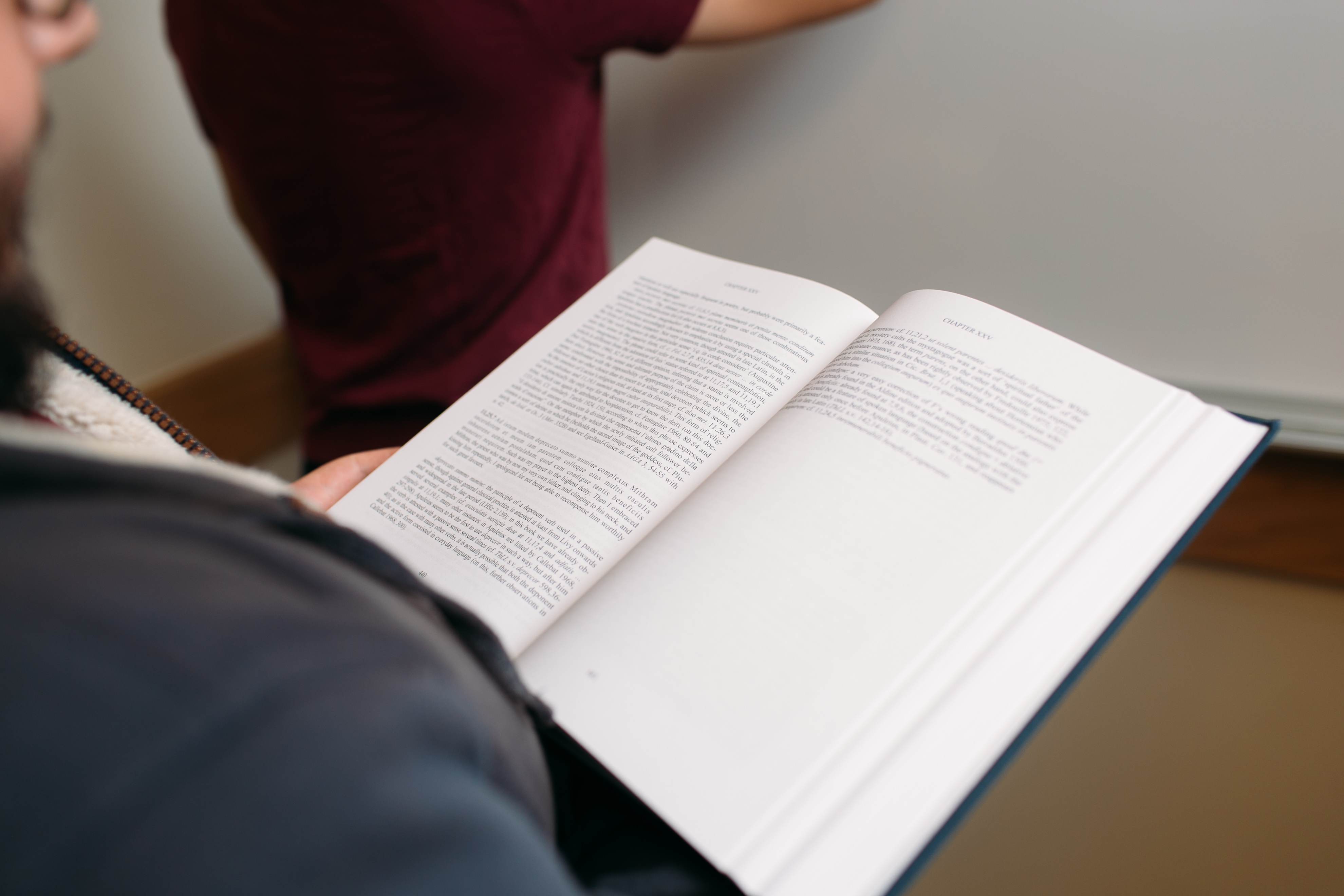 A book being held open
