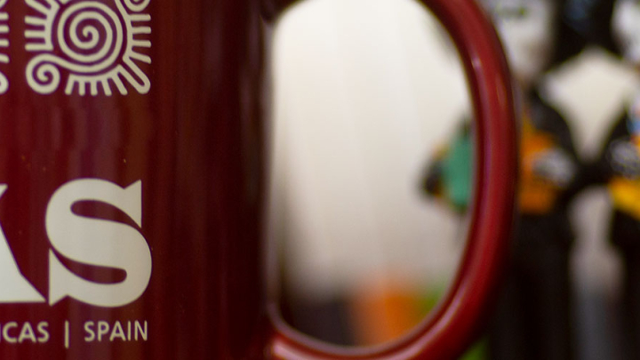 Image of a MAS Mug with day of the dead dolls