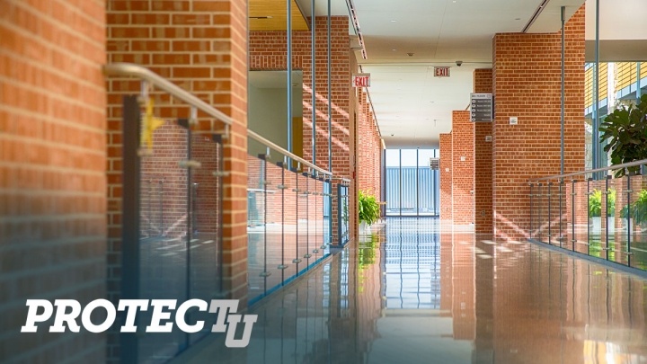 an empty CSI hallway superimposed with the ProtecTU logo