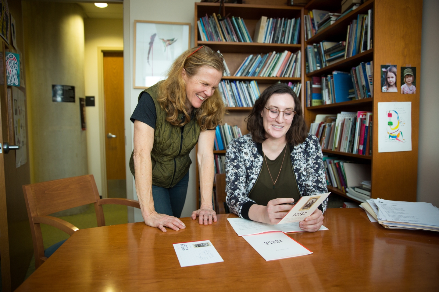Two people meeting over creative writing project.