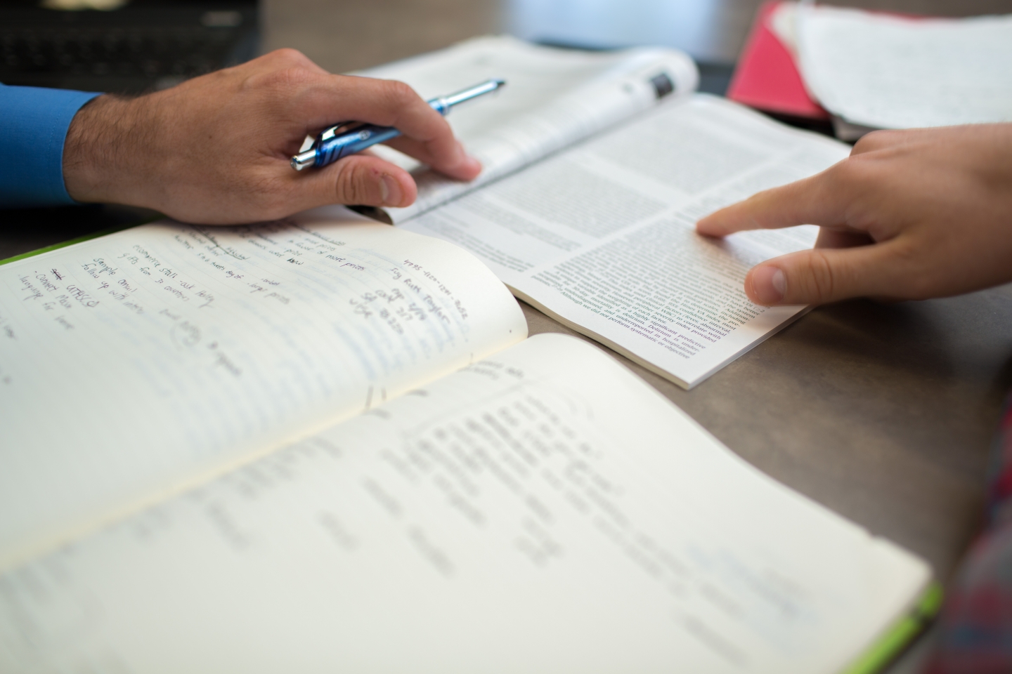 Two students discussing book