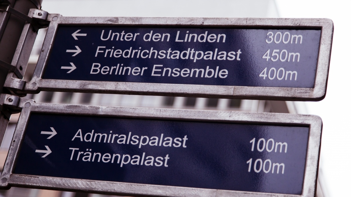 German sign with destinations in an airport