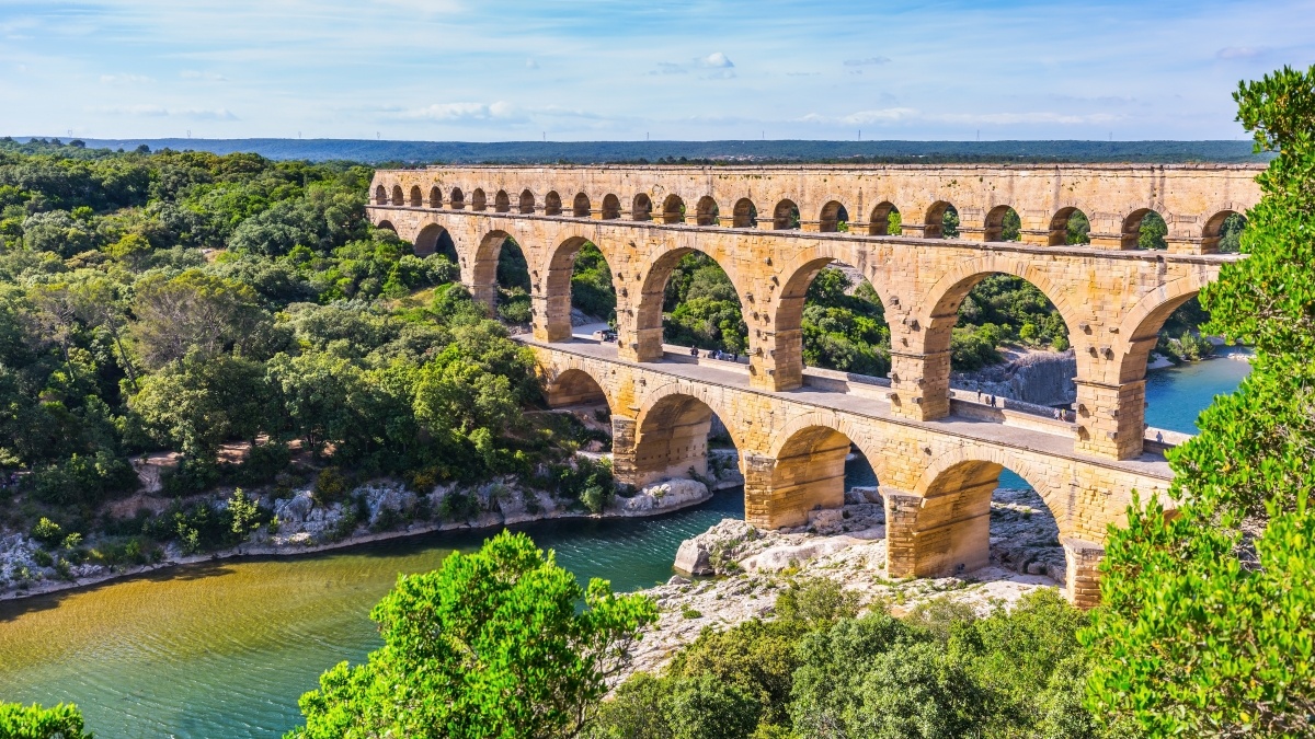 Pont du Gard, a three-tier ancient Roman aqueduct, crosses the Gardon river in southern France