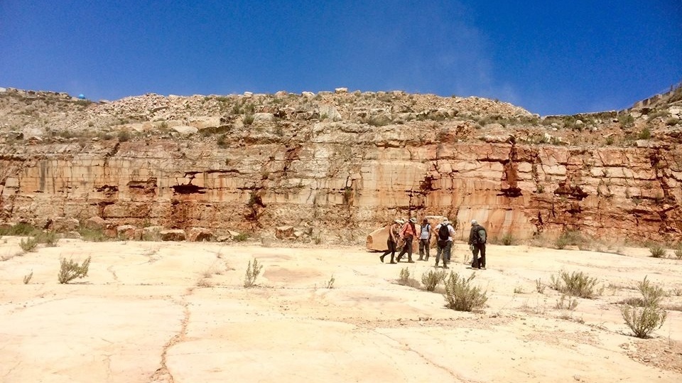 Group of students with desert landscape in the background
