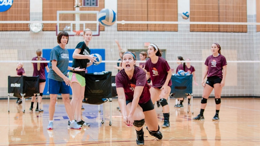 Vollyball Team Practicing in Webster Gym