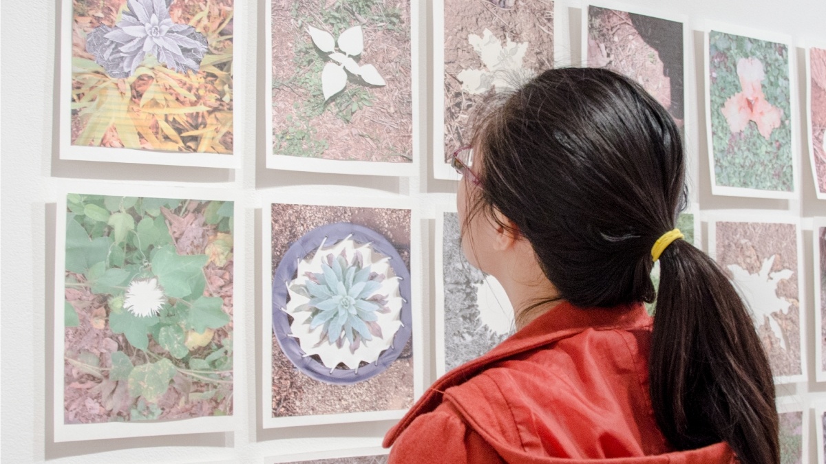 Student gazing at a piece of artwork