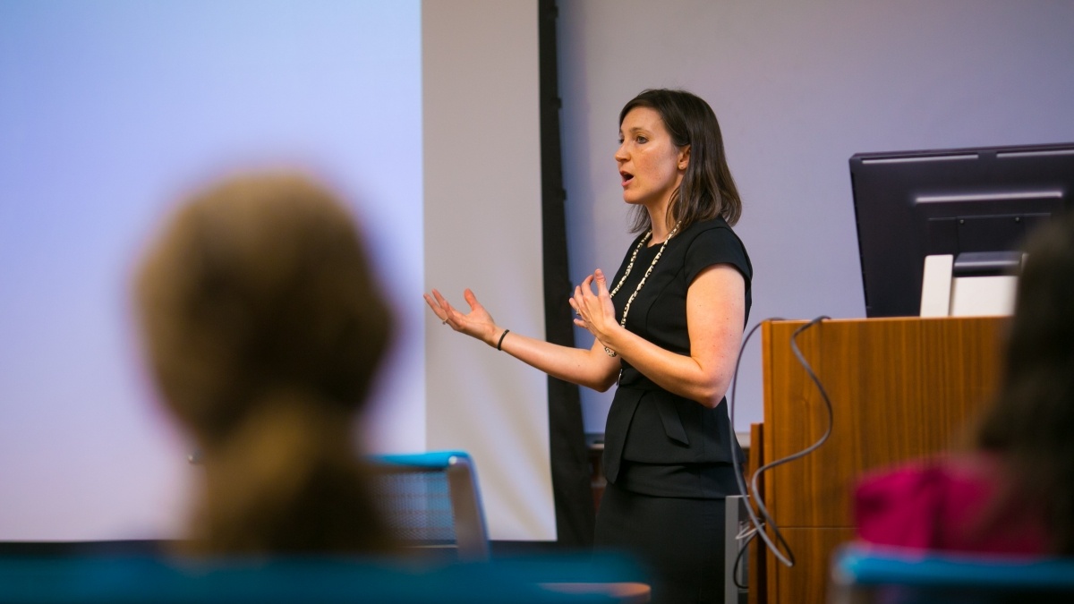 Professor at the podium in classroom